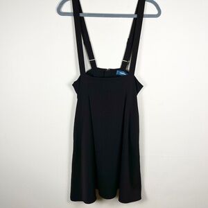 Black ModCloth skirtall with adjustable suspender buttons